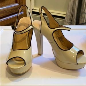 Beautiful worn once ivory patten leather